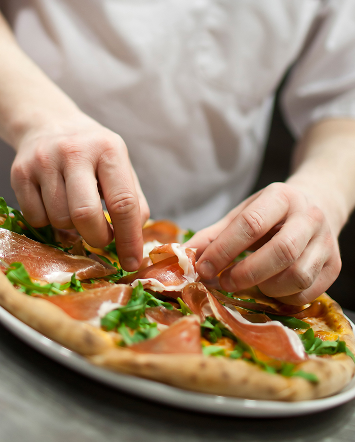 Preparing pizza