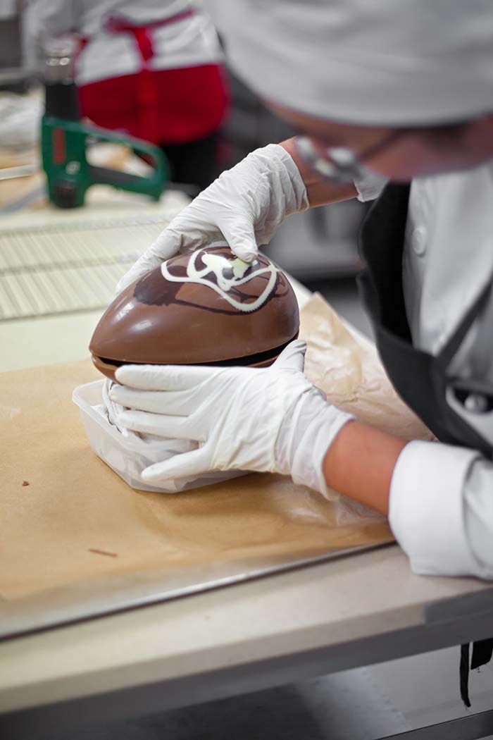 Chef creating chocolate egg