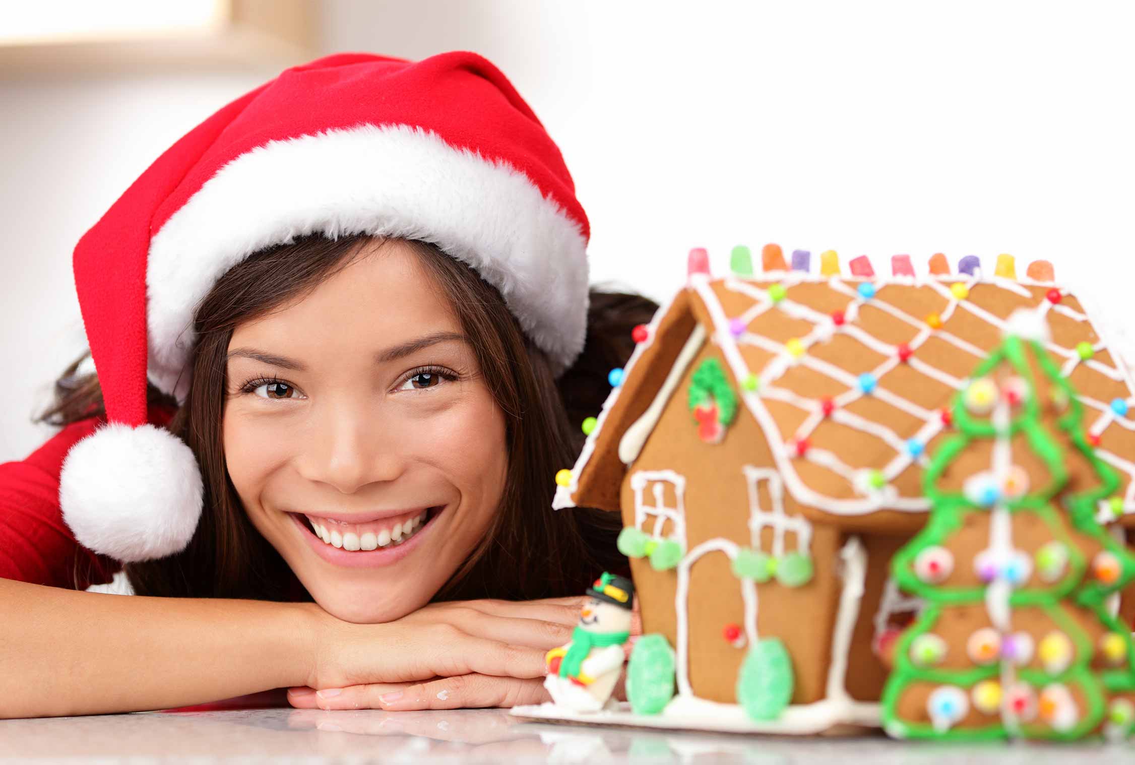 Girl with gingerbread house